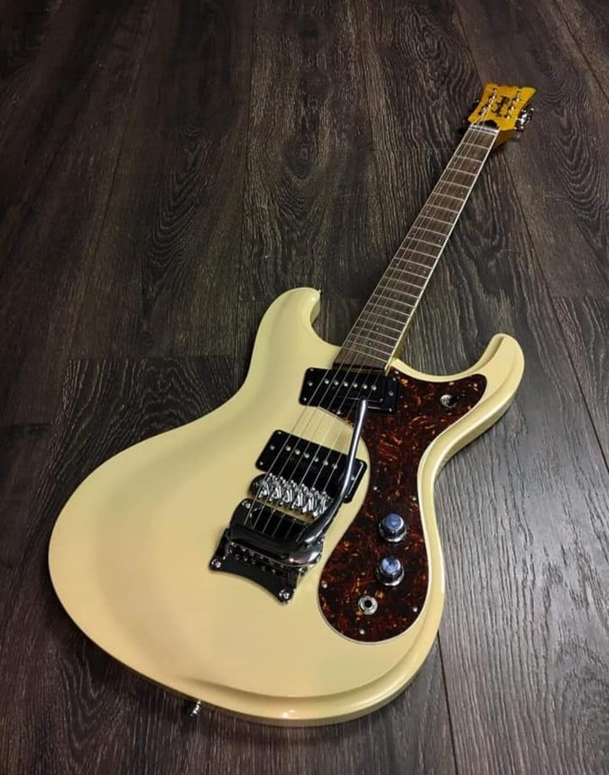 Custom Mosrite style guitar in vintage white