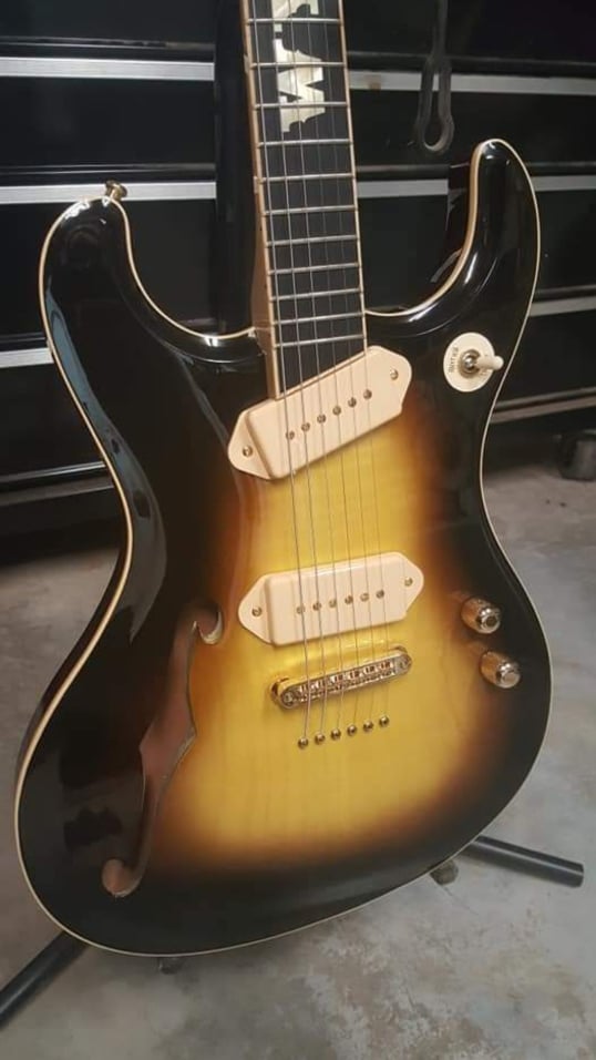 Sunburst Mosrite style guitar body with a F hole