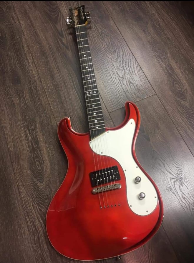 Candy apple red custom Mosrite style guitar